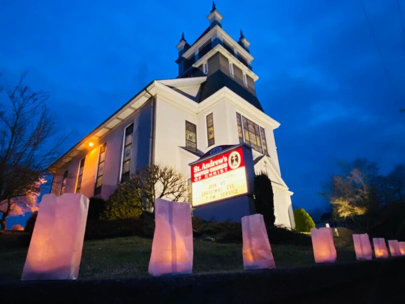 Christmas Eve with Luminaries lining the front walk and driveway