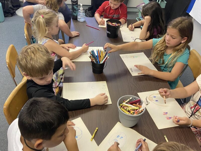 Drawing pictures and learning about the Bible
