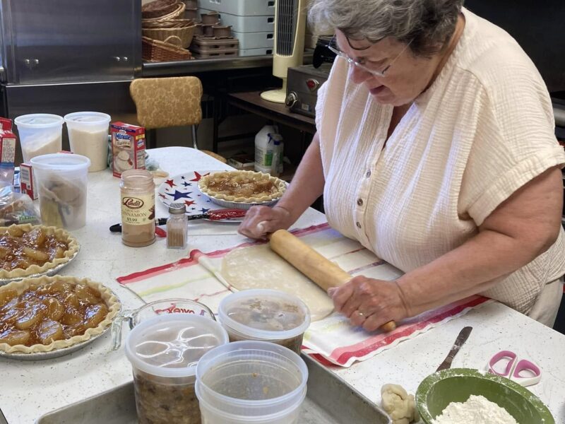 Rolling out the dough for our pies.