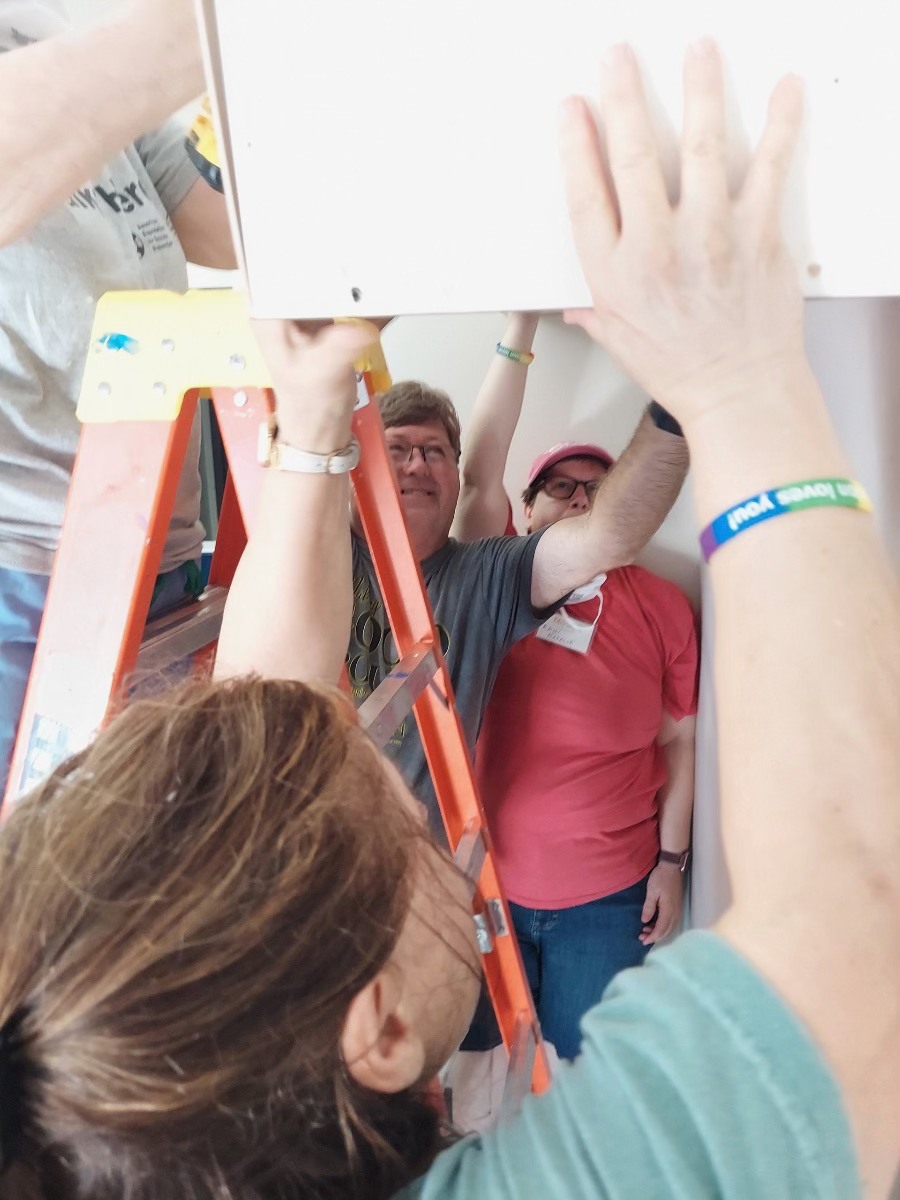 Constructing pantry shelves at Back Bay Missions
